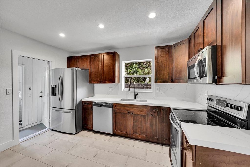 Photo of 1499 NE 33rd Street, Oakland Park, FL 33334 (MLS # F10496435)