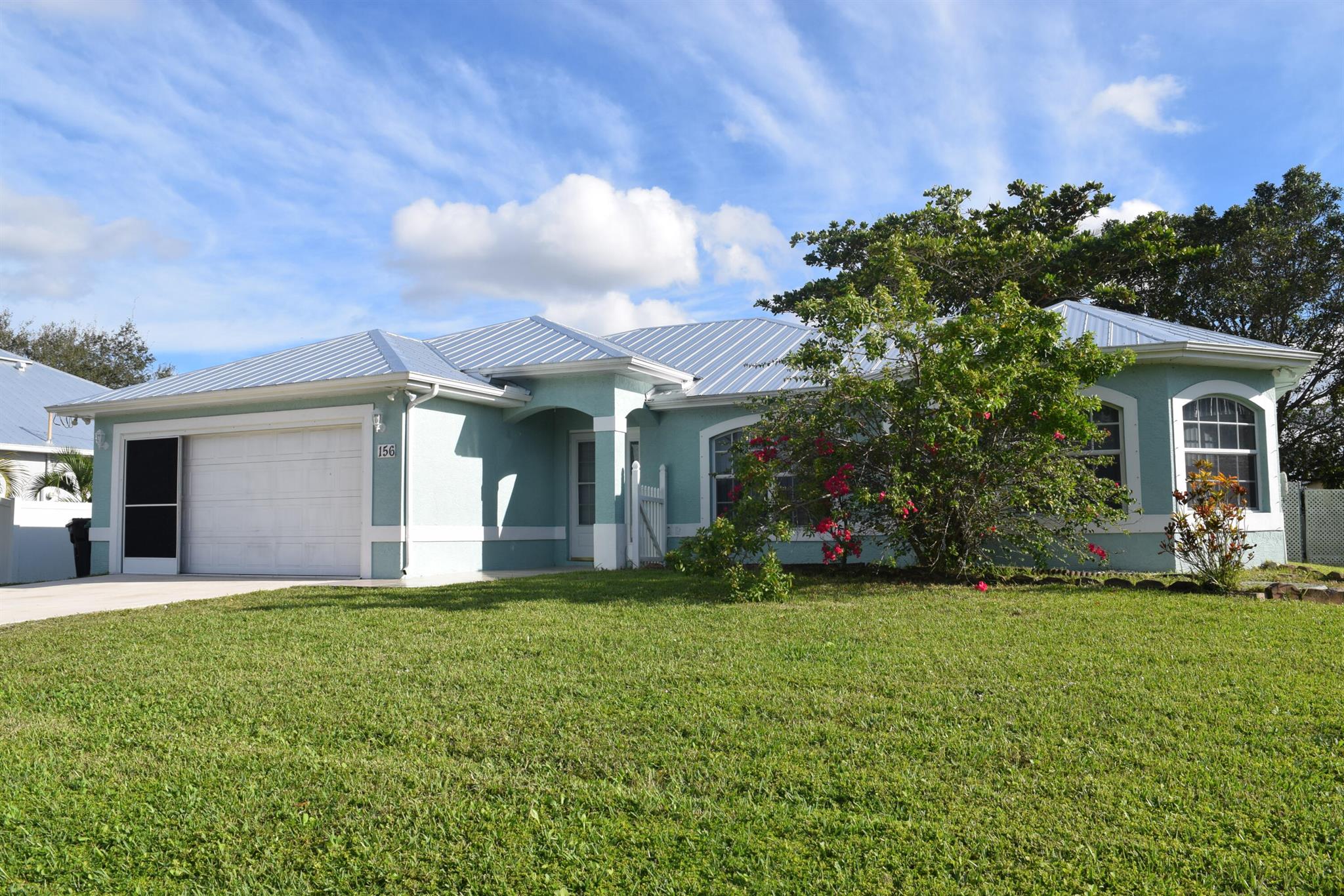 Welcome home for the Holidays, adorable and immaculately maintained 3/2/2 home, centrally located with new metal roof, spacious tiled living areas and large master suite & guest rooms with luxury vinyl flooring. Gourmet kitchen with granite counter tops, s/s appliances, a nice, oversized porch with fenced in backyard and shed.