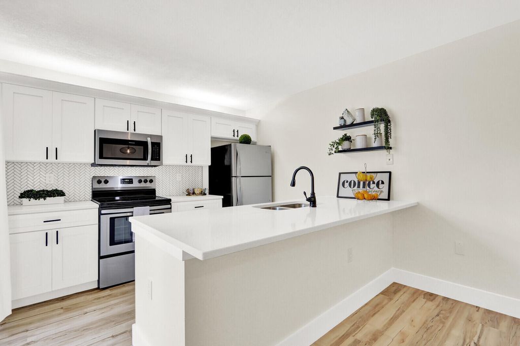 Photo of 6605 66th Way, West Palm Beach, FL 33409 (MLS # B26012867)