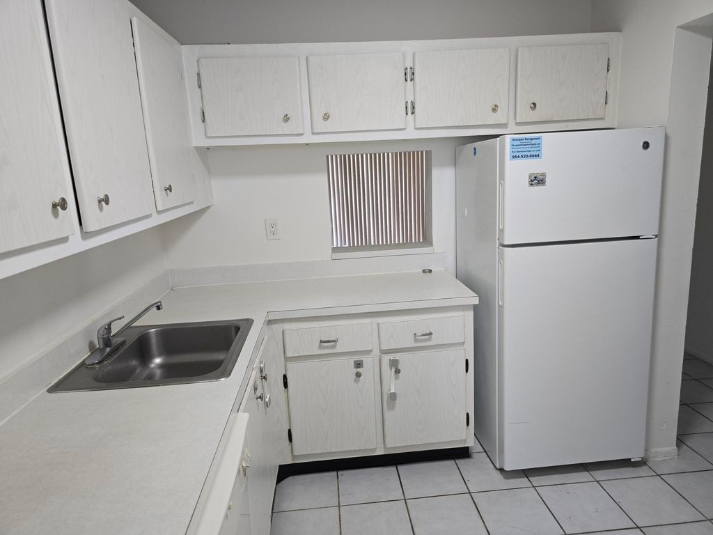 Photo of 8060 N Colony Cir Circle #203, Tamarac, FL 33321 (MLS # B26033385)