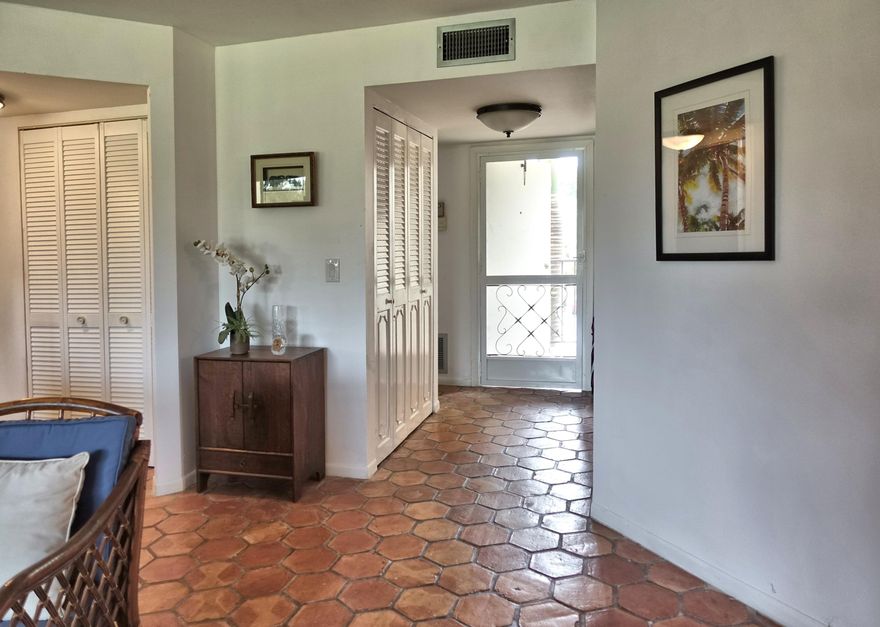 2ND FL CORNER, RENOVATED 2 BED/2 BATH IN LIGHT & BRIGHT 1200 SQ FT PLUS, WITH EXPANSIVE GOLF VIEWS; 2 NEW BATHS, NEW KITCHEN CABINETS & APPLIANCES; EAT-IN-KITCHEN, SEPARATE DINING AREA, MEXICAN TILE FLOORS, WASHER/DRYER IN UNIT,LOTS OF STORAGE, NEW FLOORING IN MASTER BED & BATHS, WHEELCHAIR ACCESSIBLE DOORWAYS IN MASTER BDRM & BATH. GREAT VIEWS & DIRECT ACCESS TO LARGE SCREENED TERRACE FROM LIVING, KITCHEN & MASTER BEDROOM. IMPACT GLASS WINDOWS & ROLL DOWN SHUTTERS. STAIRS NEARBY OR USE CONVENIENT ELEVATOR. COMMUNITY OFFERS SWIMMING POOLS, CLUBHOUSE, RESTAURANT & PAY-AS-YOU-PLAY GOLF.