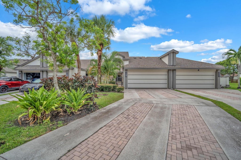 Photo of 1109 LANDINGS Boulevard, Greenacres, FL 33413 (MLS # B26088985)