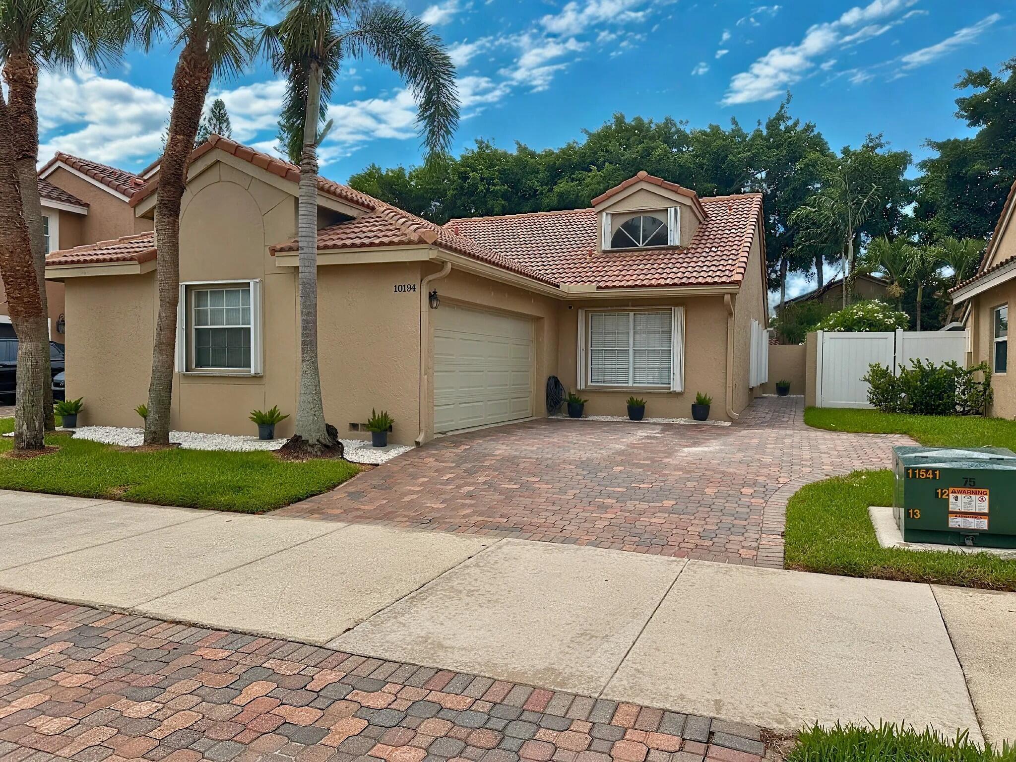 Available September 1, 2025 - Fully renovated 3BR/2BA home in West Boca with top-rated schools. Updated in February with luxury water- and scratch-resistant hardwood floors, 2024 central A/C, custom kitchen with quartz countertops, new stainless steel appliances, and built-in closets in all bedrooms. Enjoy nearly 2,000 sq ft of fenced yard, a covered patio, and pavered entertaining area. Includes 2-car garage, 2-car driveway, accordion shutters, washer/dryer, cable & internet. Quiet, family-friendly neighborhood near parks, shops, and dining. HOA approval required.