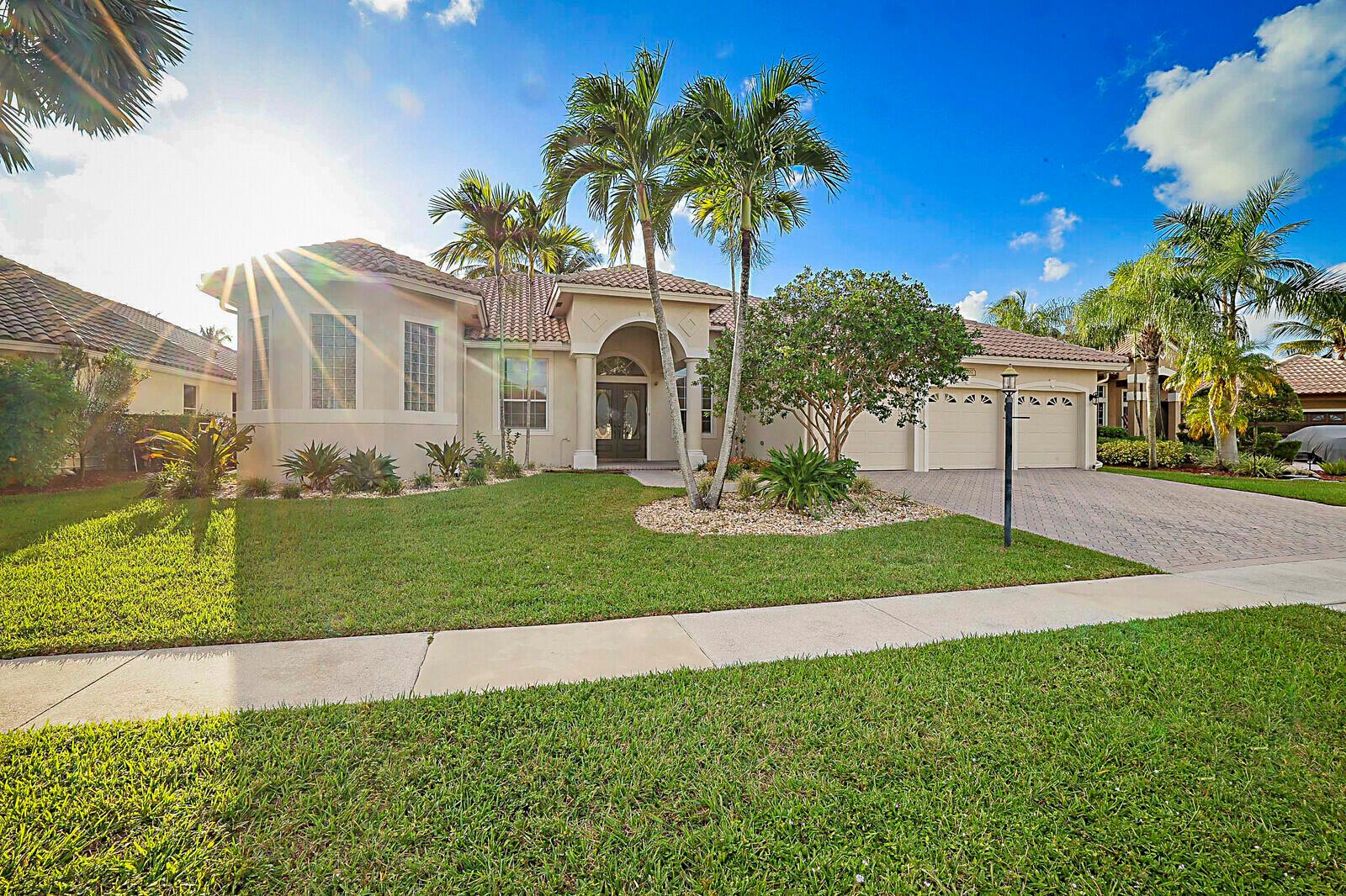 Welcome to Boca Falls! This stunning 4-bedroom plus a den/office or bonus room, 3-bathroom with a 3-car garage combines timeless design with modern convenience. Inside, you'll find soaring high ceilings, tile flooring throughout, and a desirable split floorplan that offers both privacy and functionality. The open-concept kitchen features granite countertops, stainless steel appliances, and abundant cabinet space. The oversized primary suite includes a spacious walk-in closet and spa-inspired bathroom. Enjoy the outdoor screened-in patio and private backyard lined with Clusia hedges for privacy.HOA includes basic cable, internet and landscaping. This home is also for sale RX-11135740