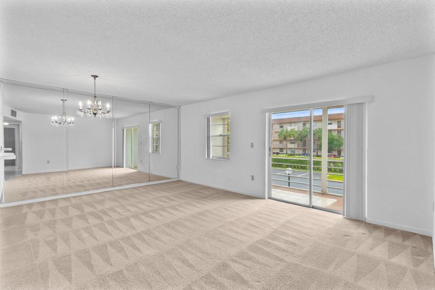Bright & Airy 2/2 condo located at Sabal Palm Village in Tamarac, 55+ Community. This cozy unit is located on the 2nd floor next to elevator and features carpet & tile flooring. Large white kitchen with small pass through to living room area. NEW A/C and 2014 W/Heater, Large master bedroom with walk-in closet and stand-up shower. Guest bedroom has mirrored closet. Screened tiled patio - Can be used as a Den/Office. Laundry room on premises located on same floor, unit comes with extra storage room. The association offers a clubhouse with library, fitness room, heated pool, BBQ area & tennis courts. Secured Lobby. Mins to Turnpike, Shopping Plazas and Restaurants. Great Primary or Seasonal residence! Priced to Sell! Schedule your viewing today! Motivated Seller!