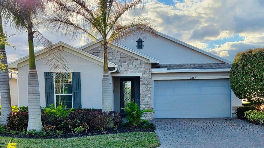 This beautiful CBS construction home was purchased as an investment home and has never been lived in full-time. It features durable impact glass windows and elegant upgraded flooring throughout. The open-concept layout showcases seamless indoor-outdoor living. Tasteful plantation blinds complement the 2 bedroom, 1 den, 2 bath home and master closet has a custom, California finish. Home has a 2 car garage and separate golf cart garage and backyard is a tranquil retreat with natural privacy screening. 

Buyer to pay ONE-TIME fees for Vitalia Cap Contribution of $2200.00 and Tradition Community Enhancement Fee equal of .97% of the sale price. The HOA provides an extensive range of amenities including cable, high-speed internet, security alarm system, meticulous lawn care, a modern fitness center, tennis and pickleball courts, a sparkling pool, and much more. Conveniently located near Cleveland Clinic, vibrant Tradition Square shopping and dining, and just about 35 minutes to the pristine beach.