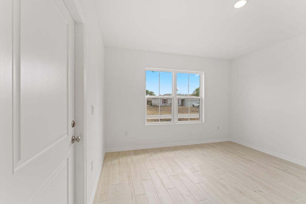 Photo of 841 NW Archer Avenue, Port Saint Lucie, FL 34983 (MLS # B26019495)