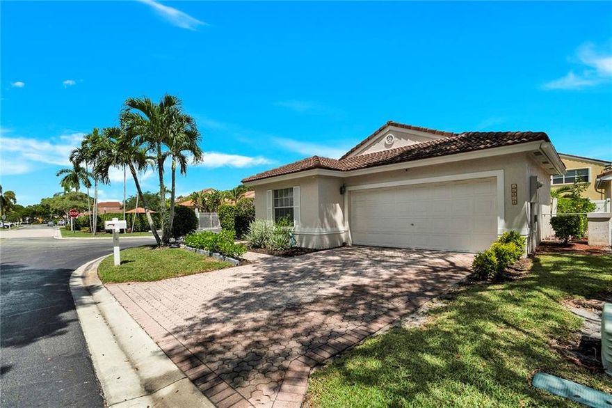 AN ABSOLUTELY BEAUTIFUL 3 Bed/2 bath home in the highly sought-after GATED neighborhood of Kensington Green in Coral Springs! The home is perfectly renovated in a Bohemian theme from top to bottom! Huge, open gourmet kitchen with top-tier Café series appliances; a large kitchen island with farmhouse sink, 42in' wooden soft-closing cabinetry,  top-level quartz countertop, custom glass tile backsplash with pot filler above stove. Ceilings are vaulted and airy, with recessed lights on dimmers; plantation shutters for each window. The home is wired for fiber-optic high-speed internet. Large bedrooms have custom wallpaper & built-out closets; bathrooms are renovated with specialty lighting. Backyard completely fenced. Great A+ school district. Close to Costco, Whole Foods, and Sawgrass Mall.