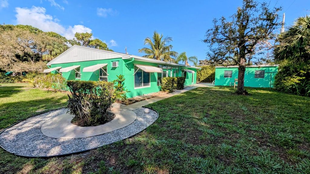 Photo of 1137 NE Kubin Avenue, Jensen Beach, FL 34957 (MLS # R11045605)