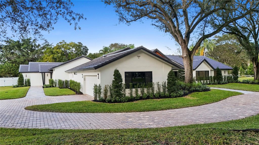 Photo of 3820 NW 101st Dr, Coral Springs, FL 33065 (MLS # F10539619)