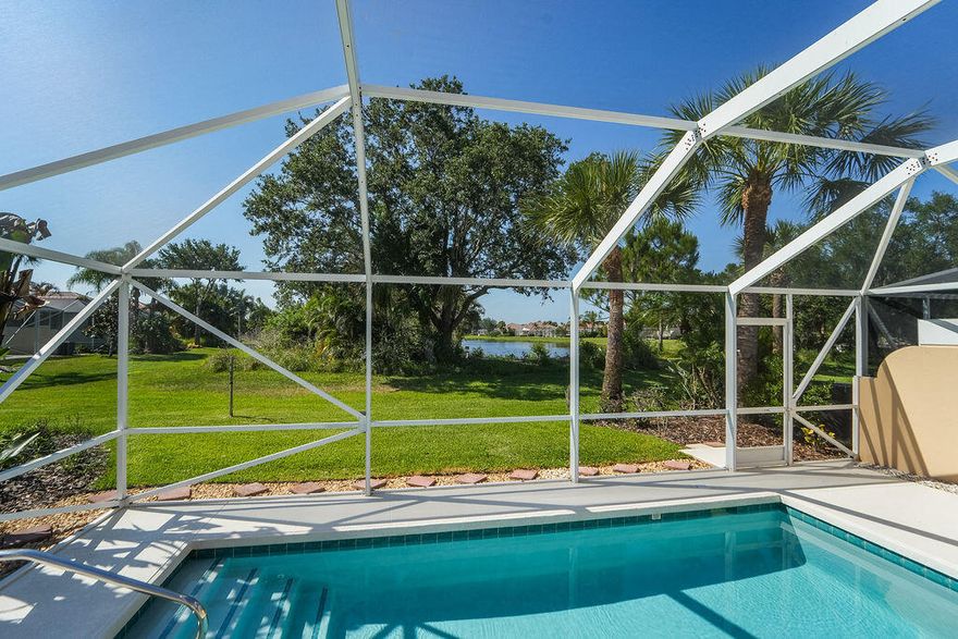 Welcome to the Retreat in beautiful Hobe Sound! This meticulously maintained 2-bedroom, 2-bath Capri model offers the perfect blend of comfort, style, and Florida living. From the moment you arrive, you'll notice the pride of ownership throughout — the home is so impeccably cared for that visitors are asked to remove their shoes upon entering.  Enjoy relaxing poolside with peaceful lake views from your private backyard oasis. Recent upgrades include fresh interior paint throughout, newly painted pool deck and sidewalk, and all-new exterior landscaping accented with beautiful decorative pebbles along the walkway leading to the home. Major updates include a 2024 A/C and 2024 hot water heater for added peace of mind.  Located in the highly desirable Retreat community at the end of Seabranch  Boulevard, this home is just minutes from the newly private Lost Lake Golf Club. Community amenities including the pool, tennis courts, and clubhouse are within walking distance. Conveniently close to shopping, restaurants, beaches, parks, and major highways, this exceptional home offers the very best of the Hobe Sound lifestyle.