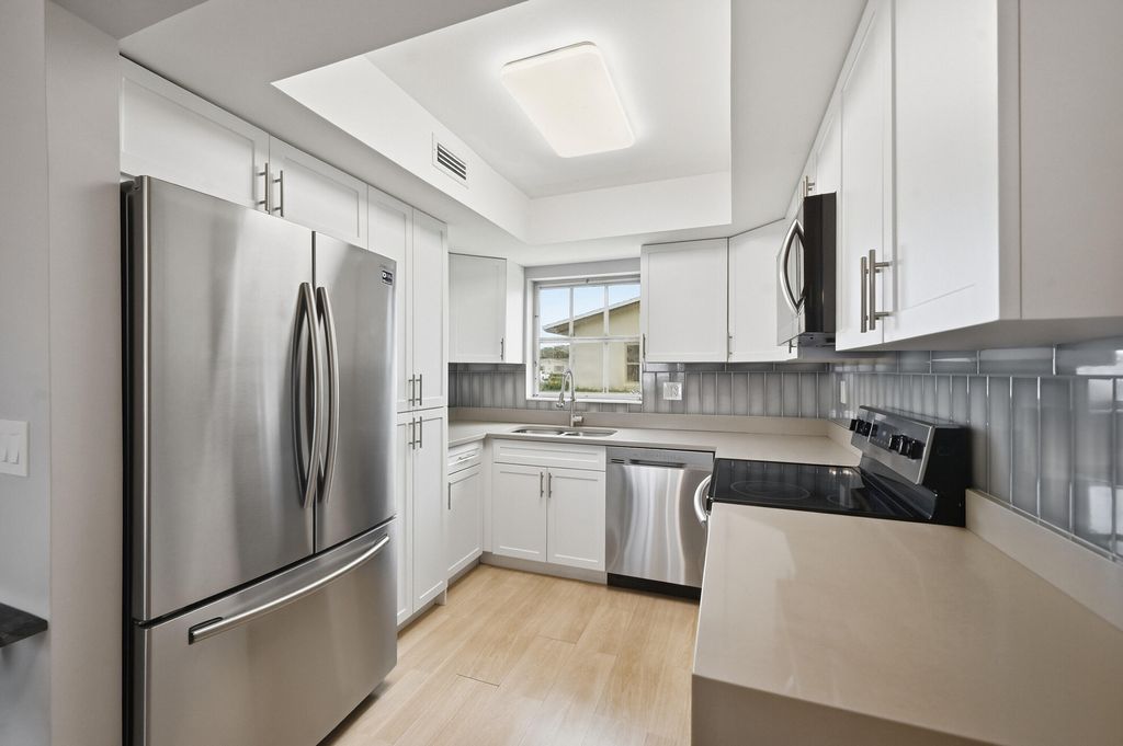 Photo of 2680 Barkley Drive E #C, West Palm Beach, FL 33415 (MLS # B26022098)