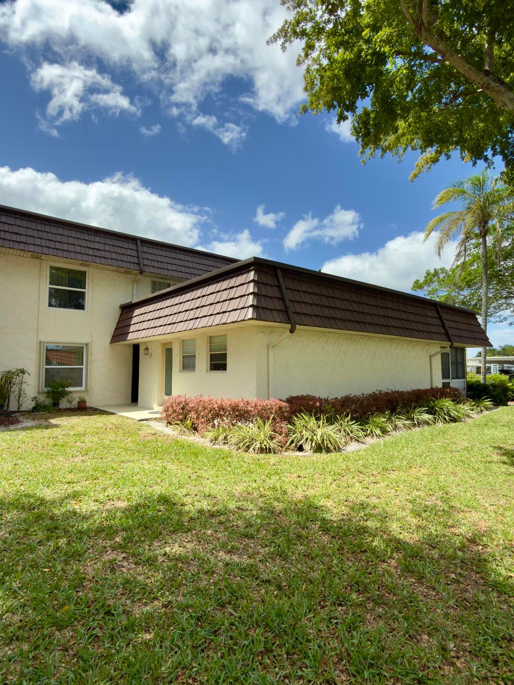 Photo of 12005 Poinciana Boulevard #103, Royal Palm Beach, FL 33411 (MLS # B26020442)