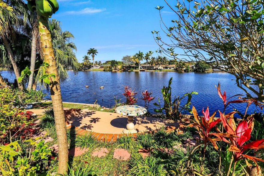 Beautifully updated and renovated 3BR/2BA with Gorgeous Pool.  Conveniently located in West Sunrise with wide lake views and a sparkling pool. This spacious home features a fully upgraded kitchen with stainless steel appliances and quartz countertops, renovated bathrooms, impact windows, tile flooring throughout. Enjoy a triple-wide brick paver driveway and a prime location near Sawgrass Mills shopping, dining, and easy access to the Sawgrass Expressway.   Owner is fond of Butterflies and has a large area with all types of Butterfly specific plants.  Have your own Butterfly sanctuary in your own Back Yard.  A must-see!