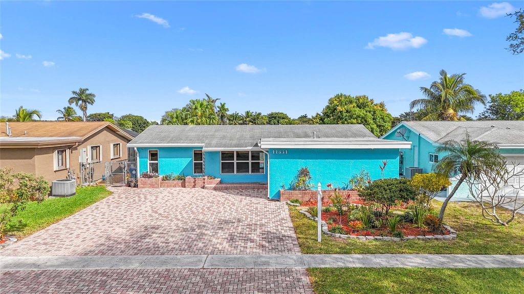 Photo of 11831 NW 31st Place, Sunrise, FL 33323 (MLS # F10551625)