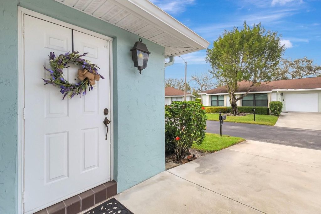 Photo of 9800 Pecan Tree Drive #B, Boynton Beach, FL 33436 (MLS # F10545214)