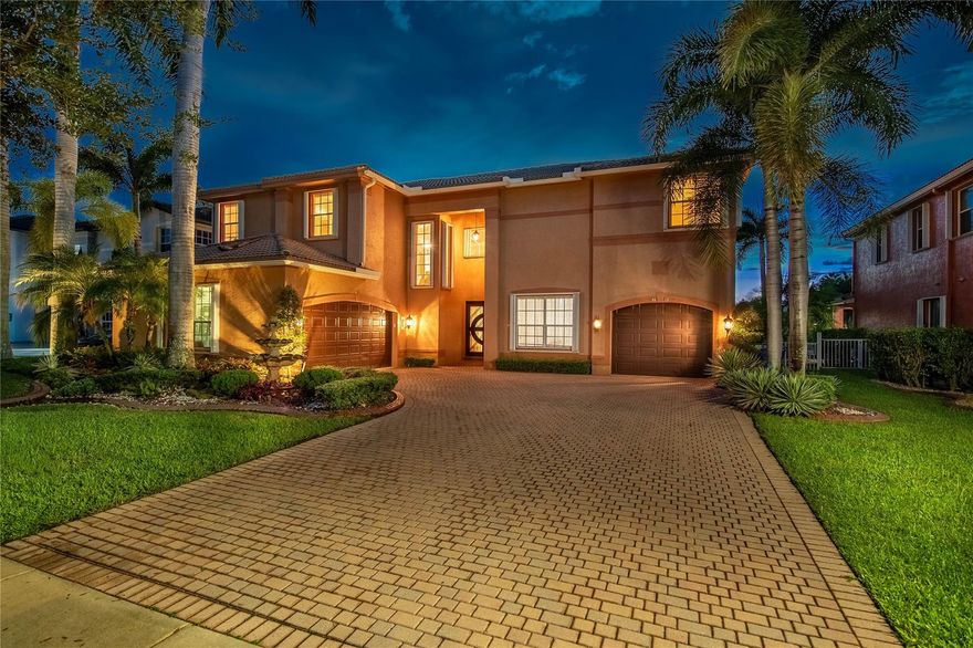 Elegant 4BR/office/big loft /3.5 BA home featuring marble floors on the main level, hardwood stairs & second floor, and a custom wrought-iron staircase. One bedroom downstairs with a private bathroom and office, spacious layout with gourmet kitchen, formal dining, and a luxurious primary suite. Enjoy outdoor living with a resort-style pool with jacuzzi, screened patio, and screened balcony. High ceilings, abundant natural light, and premium finishes throughout. Homeowners Association includes internet,  alarm, cable and 5-star clubhouse