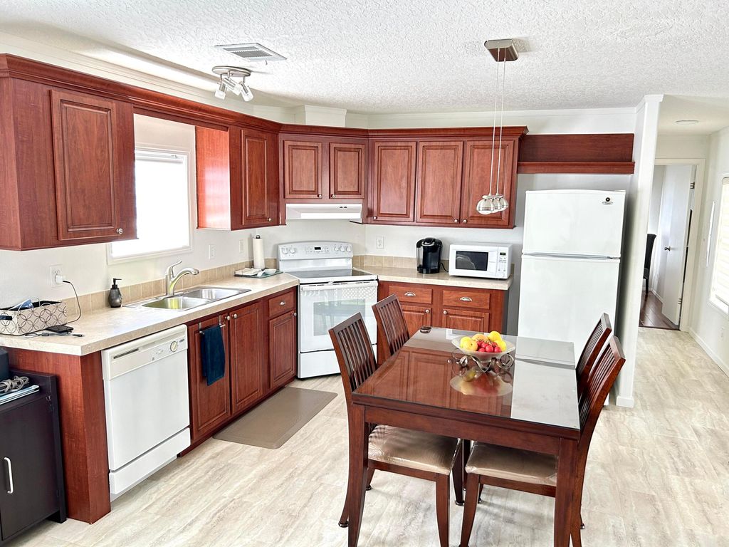 Photo of 613 Jasmine Lane, Deerfield Beach, FL 33442 (MLS # R11167322)