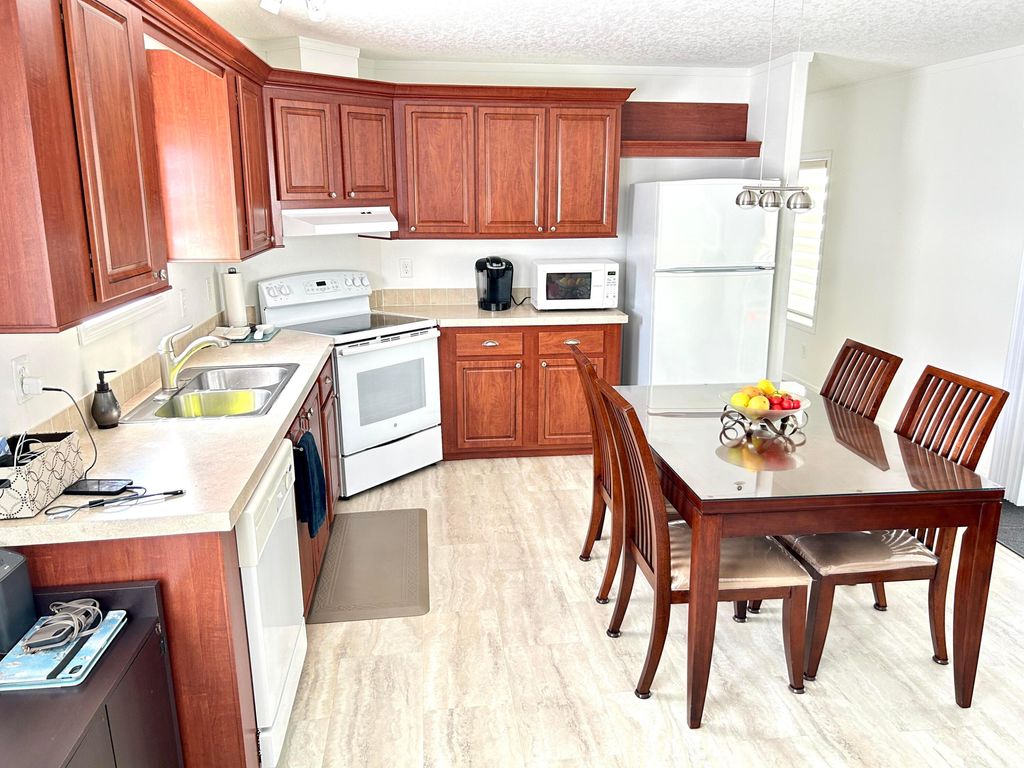 Photo of 613 Jasmine Lane, Deerfield Beach, FL 33442 (MLS # R11167322)