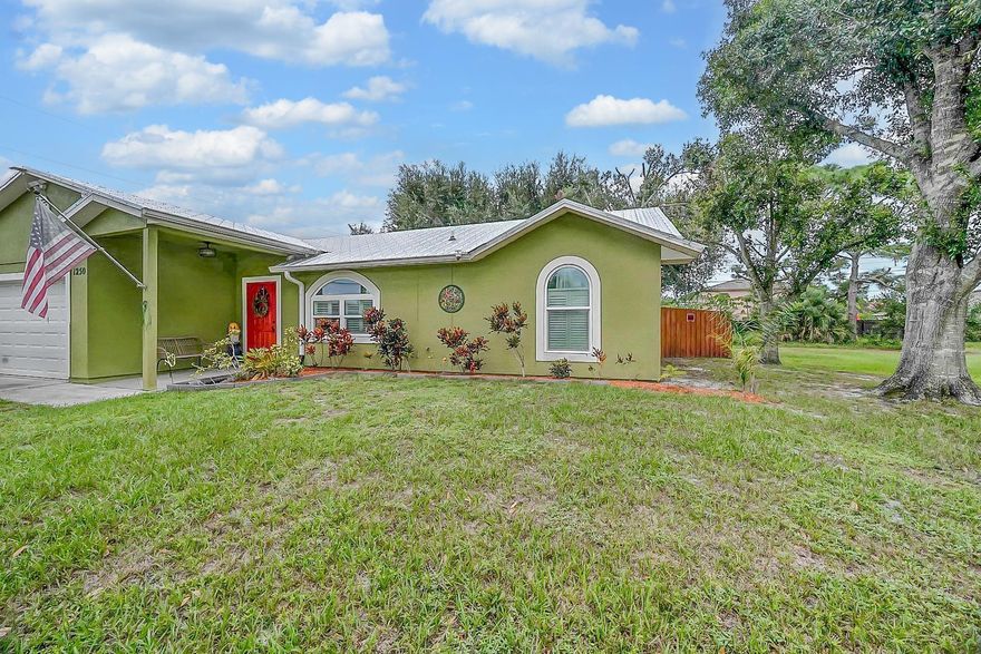 Move-In Ready Home Just Minutes from Tradition!Welcome to this charming, move-in ready home located in a quiet and desirable Port St. Lucie neighborhood, just minutes away from the vibrant Tradition area, top-rated schools, shopping, dining, and major highways.Featuring a durable 2022 metal roof, Impact windows, 2024 AC. This home offers peace of mind and low maintenance for years to come. Inside, you'll find a well-maintained interior with an inviting layout perfect for comfortable living and entertaining.Enjoy Florida living with a spacious screened-in porch overlooking the open backyard, ideal for gatherings, gardening, or simply relaxing in the sun. Whether you're a first-time homebuyer, snowbird, or investor, this home checks all the boxes for location, condition, & lifestyle.