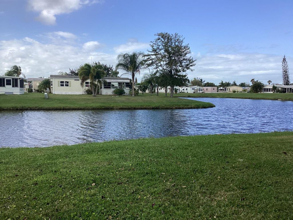 Photo of 7 La Paloma Lane, Port Saint Lucie, FL 34952 (MLS # R10975181)