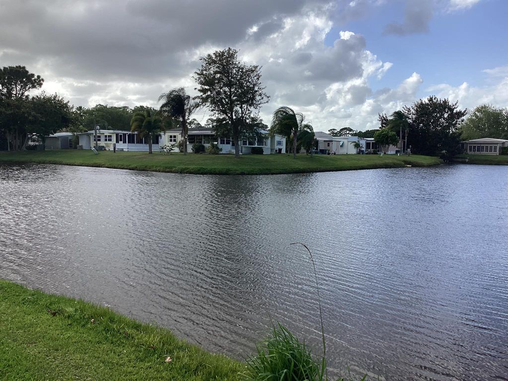 Photo of 7 La Paloma Lane, Port Saint Lucie, FL 34952 (MLS # R10975181)