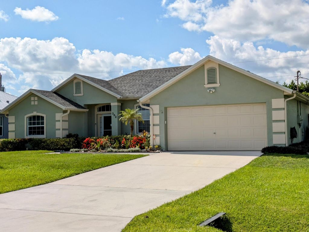Photo of 302 SW Log Drive, Port Saint Lucie, FL 34953 (MLS # R11159210)