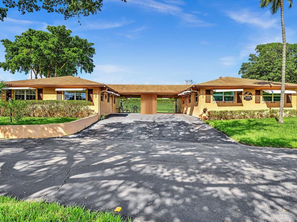 Photo of 747 Whippoorwill Lane, Delray Beach, FL 33445 (MLS # R11023524)