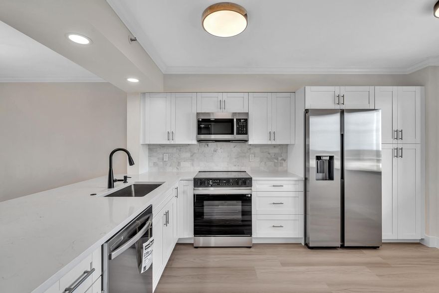 COMPLETELY remodeled 2-bedroom, 2-bathroom Penthouse 8th-floor unit offers breathtaking lake views and top-of-the-line modern upgrades. EVERYTHING is NEW including IMPACT WINDOWS and DOORS, luxury flooring throughout, brand new kitchen with high-end stainless steel appliances, and beautifully designed bathrooms. Located in the gated community of Huntington Lakes, residents enjoy a renovated clubhouse with incredible amenities, including a 610-seat theater, art room, fitness center, five pools, seven pickleball courts, and tennis courts. Plus, there's a vibrant selection of clubs and activities to join! Just minutes from Downtown Delray, you'll have easy access to amazing restaurants, shopping, and pristine beaches.