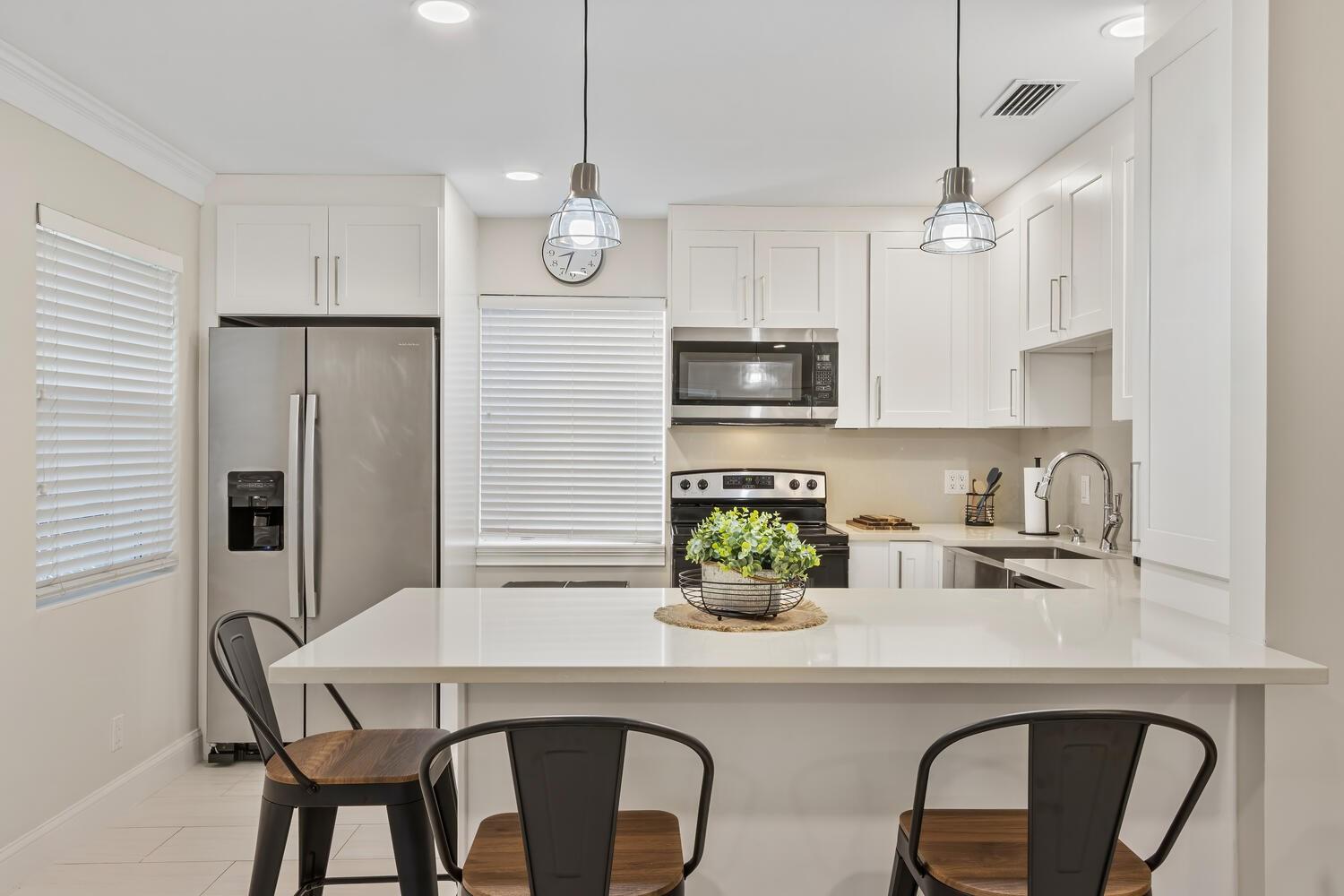 Walk to the beach! Located on a cute quiet street, this fully furnished, newly renovated 2-Bedroom, 1-Bath unit offers central A/C, Impact Windows, Stainless Steel Appliances + additional locked storage area with Washer and Dryer. Water included. Minutes to Premier Golf, Downtown and Beaches.