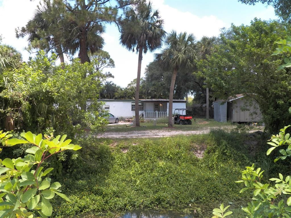 Photo of 4357 SW 83rd Street, Palm City, FL 34990 (MLS # R10721248)