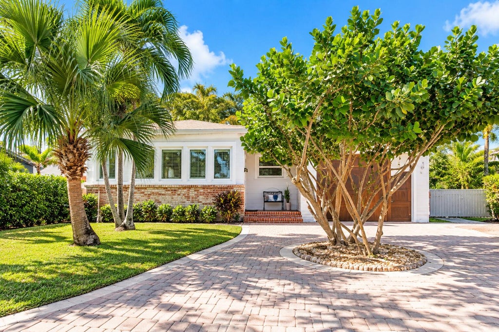 Photo of 421 N Ocean Breeze, Lake Worth Beach, FL 33460 (MLS # B26088700)