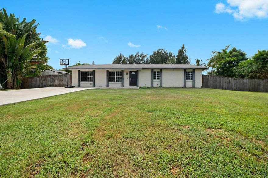 NEW EXTERIOR PAINT 2026 AND A BRAND NEW ROOF JULY 2025. LOCATED IN THE PRESTIGIOUS SOUTHWEST RANCHES AND EQUESTRIAN COMMUNITY WITH NO HOA FEES. BEAUTIFUL REMODELED KITCHEN WITH QUARTZ COUNTER TOPS, 42" WOOD CABINETS, TILED BACKSPLASH, UNDER CABINET LIGHTING, PANTRY PULLOUTS, LAZY SUSAN AND NEWER STAINLESS STEEL APPLIANCES. LARGE LIVING AREAS, HUGE FAMILY ROOM AND UPDATED BATHROOMS. PATIO SCREEN ENCLOSURE REPLACED IN 2022, POOL RESURFACED WITH DIAMOND BRITE IN 2021 AND THERE IS A SOLAR WATER HEATER. THIS ACRE PROPERTY IS FULLY FENCED WITH 145 FEET ACROSS THE BACK ON THE CANAL. PLENTY OF ROOM TO ADD A WORKSHOP OR BARN.