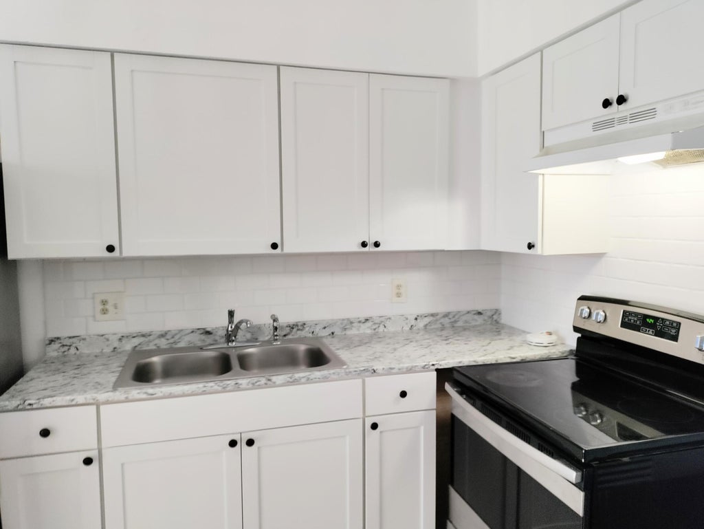 Photo of 2760 N Dixie Highway #2, Boca Raton, FL 33431 (MLS # B26077421)