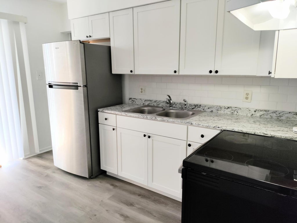Photo of 2760 N Dixie Highway #2, Boca Raton, FL 33431 (MLS # B26077421)