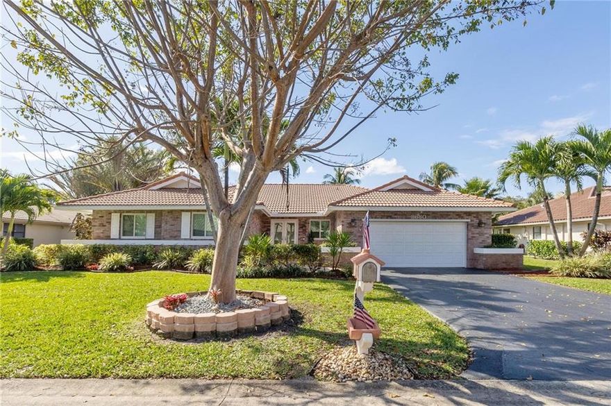 A truly stunning home located in the prestigious community of Pine Ridge.  You don't want to miss this one!  It is one of the largest sq ft. homes in the community. With a wide open floor plan excellent for entertaining, raising a family, or for some peace and quiet.  Tons of natural light enter the home from every angle and sliding glass doors that all open up to the pool give an amazing indoor outdoor feel unlike other homes.  The home also has huge vaulted ceilings, a remodeled kitchen, new vinyl plank floors, and new diamond bright pool and blue glass tile.  PGT Impact front doors and front windows. Real Fireplace! Air Conditioner Replaced 2017 Roof Replaced 2009