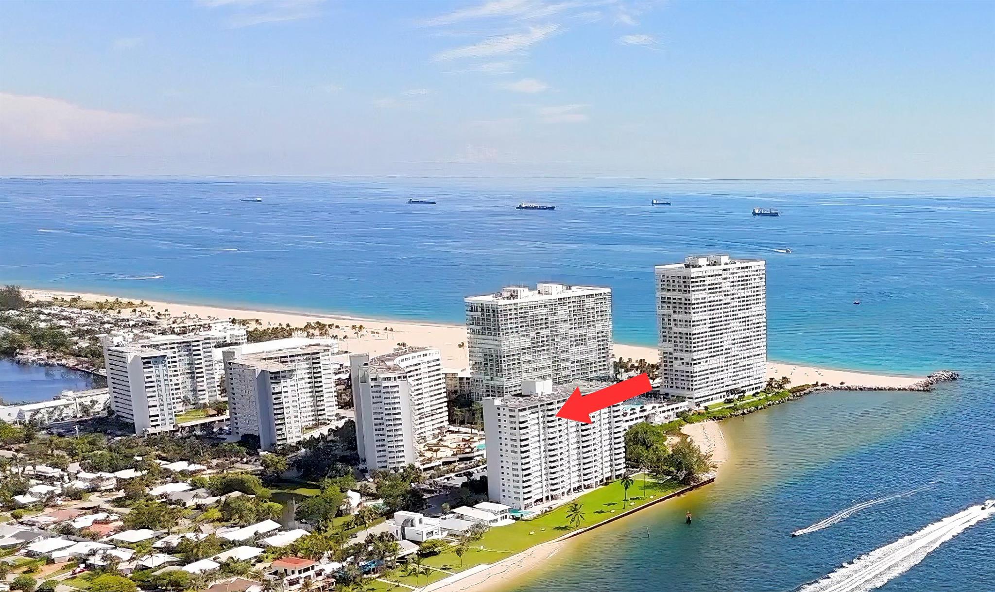 Be the envy of friends and soar high above the turquoise inlet, ocean and beach! Sweeping, postcard-perfect views from this renovated unit overlooking a parade of ships, the beach shoreline, and even Miami in the distance! It's a stunning 180-degree view of nothing but blue water and greenery from this coveted, high-balcony unit, only 2 floors from the top! Public beach a block away! Enjoy a spacious, open kitchen with handsome pinewood cabinetry and breakfast bar. Hurricane impact windows! Beautiful, oversized travertine tile floors throughout the living areas complement the kitchen earth tones. New washer/dryer & wall oven! Fully updated bathroom w/ step in glass shower. Amenities: fitness center, party rooms, putting green, pool on the inlet, extra storage, live security, cable/wifi.
