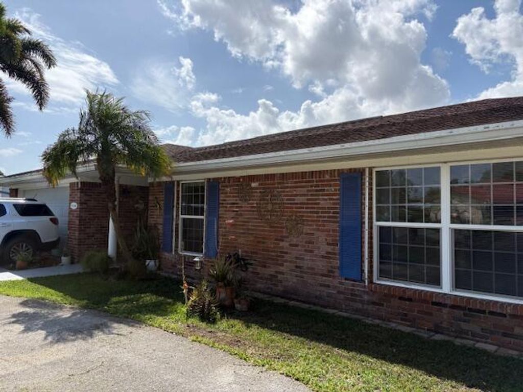Photo of 402 Saginaw Avenue, Clewiston, FL 33440 (MLS # B26015463)