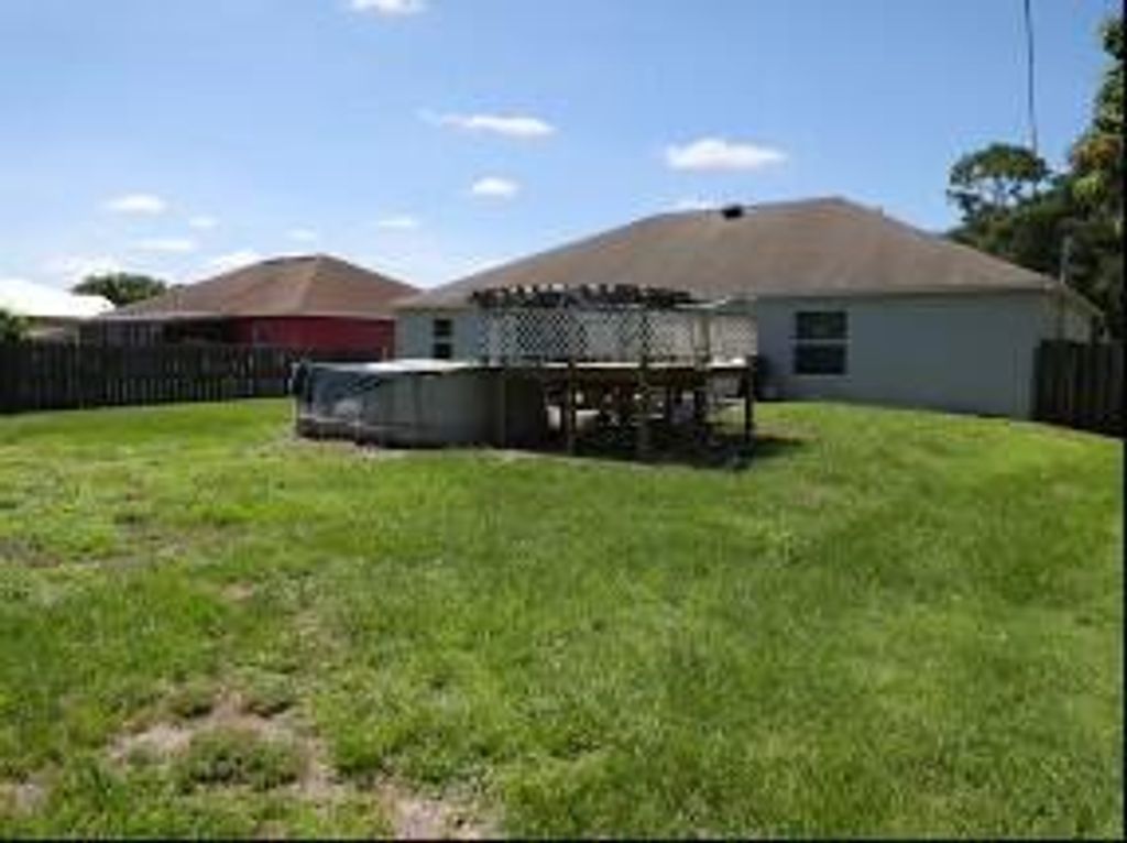 Photo of 1237 SW Janette Avenue, Port Saint Lucie, FL 34953 (MLS # R11008120)