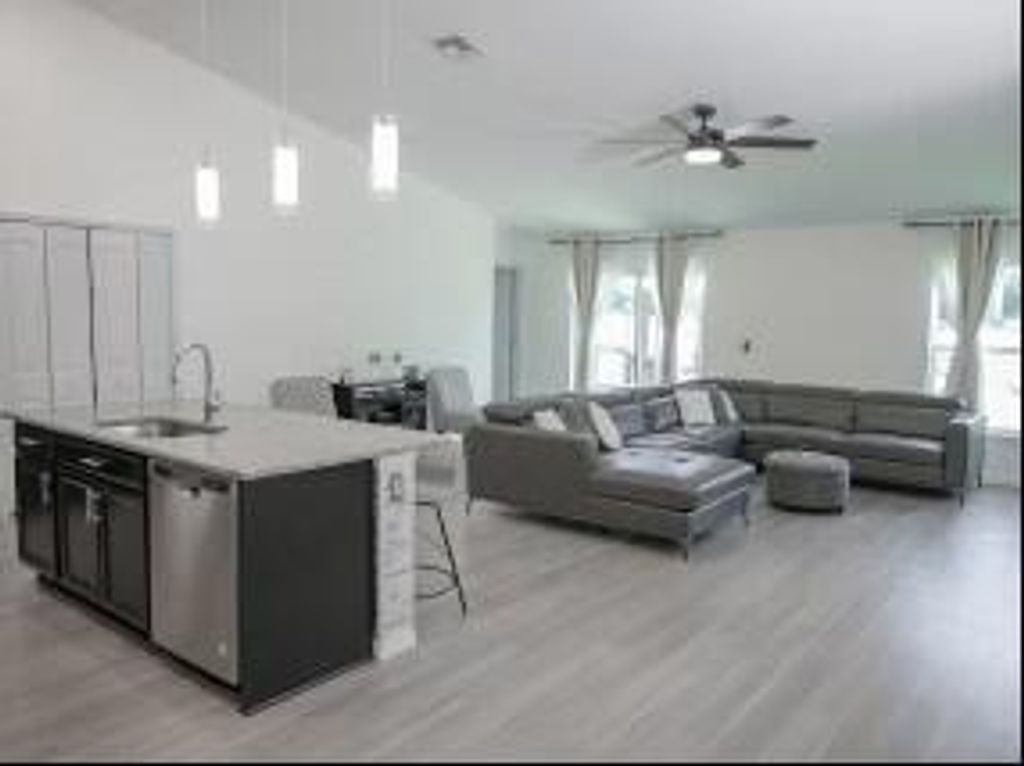 Photo of 1237 SW Janette Avenue, Port Saint Lucie, FL 34953 (MLS # R11008120)