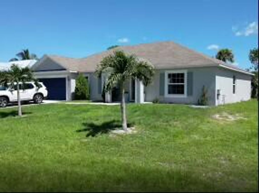 Photo of 1237 SW Janette Avenue, Port Saint Lucie, FL 34953 (MLS # R11008120)