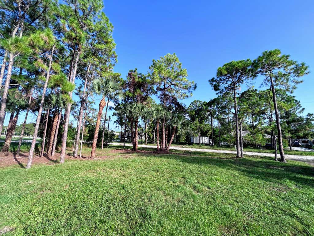 Photo of 13753 78TH Place N, The Acreage, FL 33412 (MLS # B26065395)