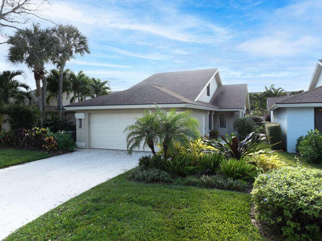 Photo of 144 Sand Pine Drive, Jupiter, FL 33477 (MLS # R10948862)