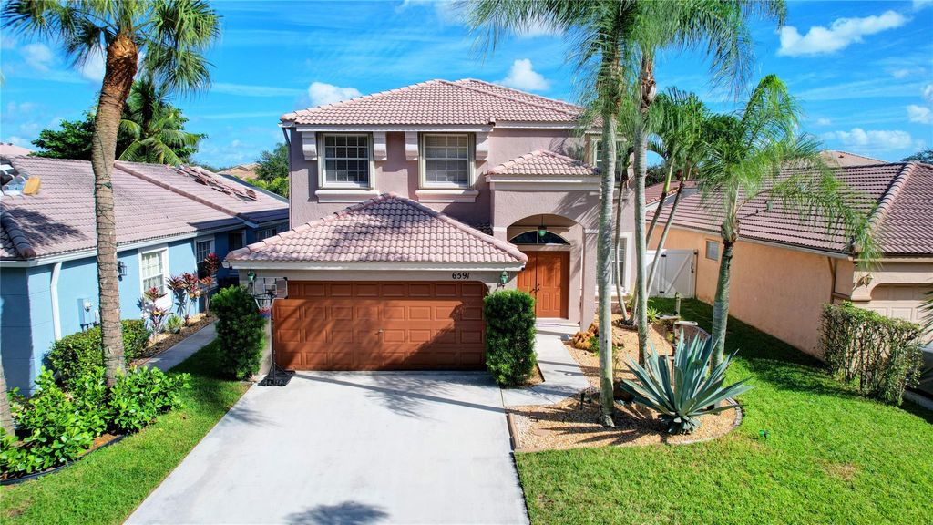 Photo of 6591 Columbia Avenue, Lake Worth, FL 33467 (MLS # F10410660)