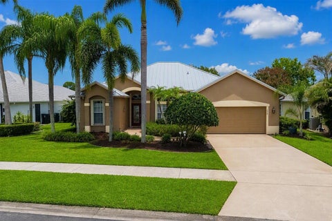 Photo of 208 SW Whitewood Drive, Port Saint Lucie, FL 34953 (MLS # B26075245)