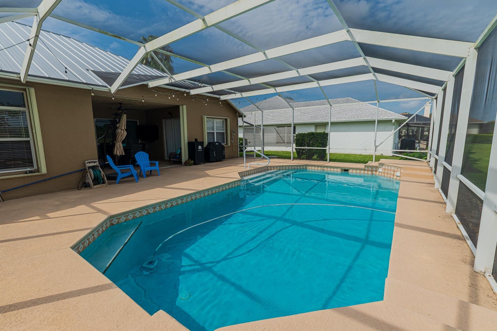 Photo of 208 SW Whitewood Drive, Port Saint Lucie, FL 34953 (MLS # B26075245)