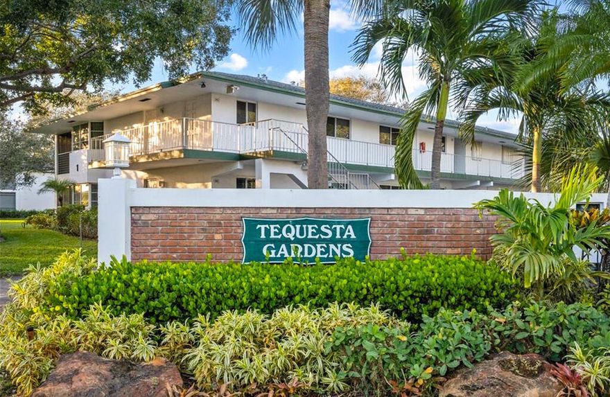 This well-maintainted 2BR/2BA first-floor unit in Tequesta Gardens features a new A/C (2025), upgraded wood-look porcelain tile throughout, and an enclosed porch. The building has a new roof and new exterior paint. Tequesta Gardens is a beautiful, quiet 55+ community just minutes away from beaches, shopping, and dining. Enjoy the community's clubhouse, two pools, BBQ area, putting green, and shuffleboard courts. Quarterly fee includes water, sewer, Comcast Xfinity cable TV, building insurance, and property maintenance.