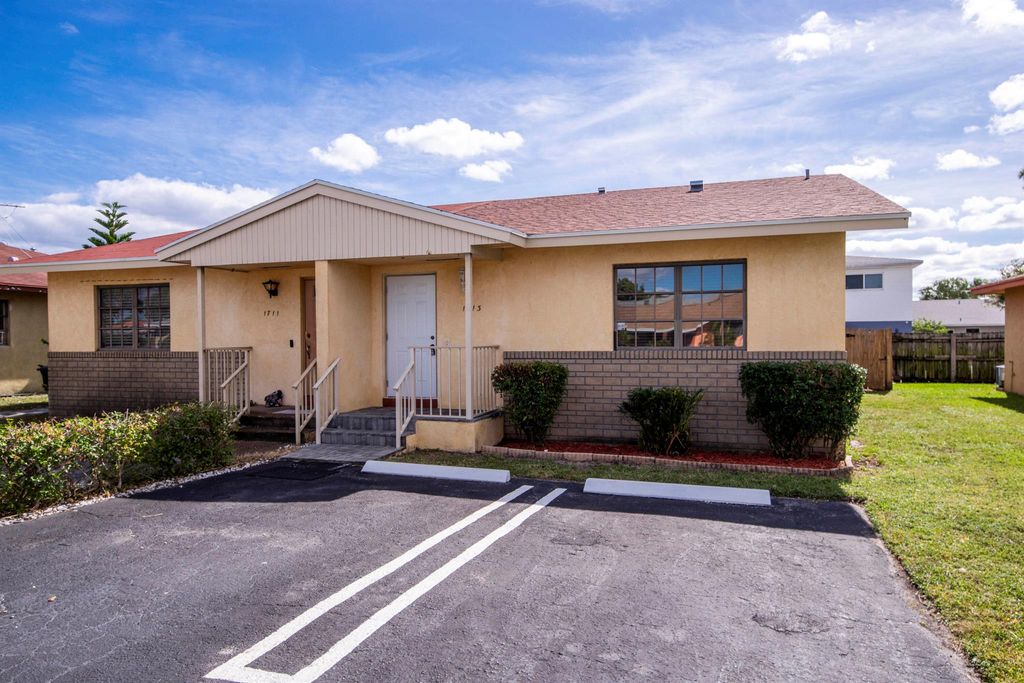 Photo of 1713 Barton Court, Lake Worth Beach, FL 33460 (MLS # R11141746)