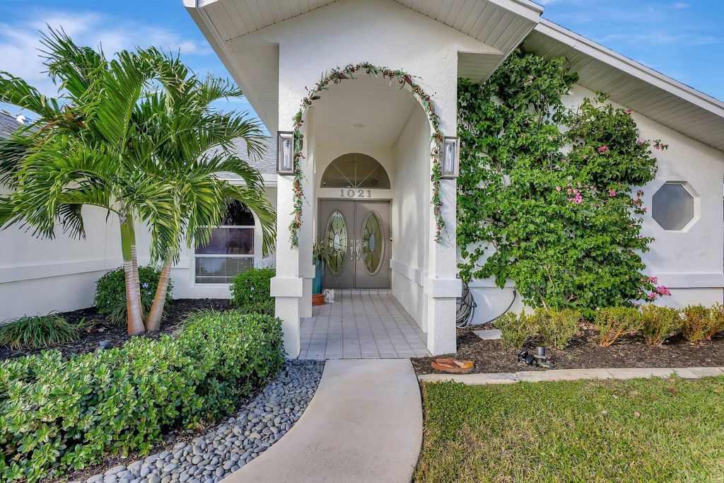 Photo of 1021 SE Walters Terrace, Port Saint Lucie, FL 34983 (MLS # R11043111)