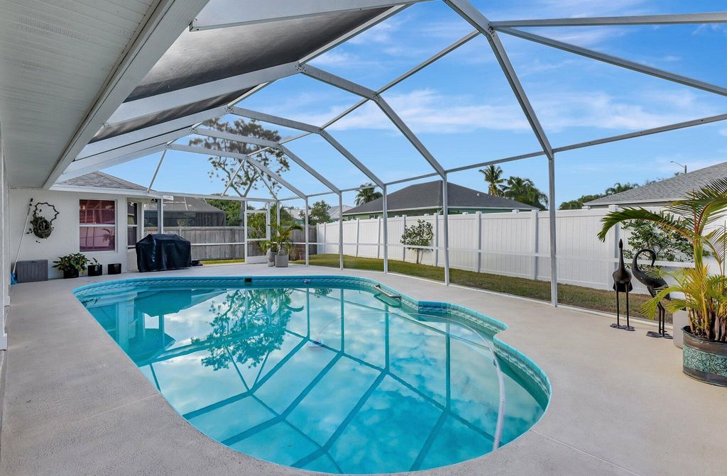 Photo of 1021 SE Walters Terrace, Port Saint Lucie, FL 34983 (MLS # R11043111)